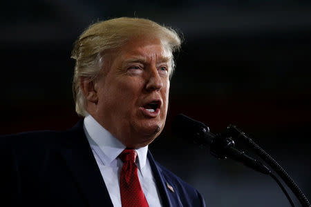 U.S. President Donald Trump delivers remarks U.S. President Donald Trump delivers remarks at the American Center for Mobility, a test facility for driverless car technology for American Manufactured Vehicles in Ypsilanti Township, Michigan, U.S. March 15, 2017. REUTERS/Jonathan Ernst