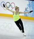 Gracie Gold of the United States skates during a practice session at the figure stating practice rink at the 2014 Winter Olympics, Monday, Feb. 17, 2014, in Sochi, Russia. (AP Photo/Darron Cummings)