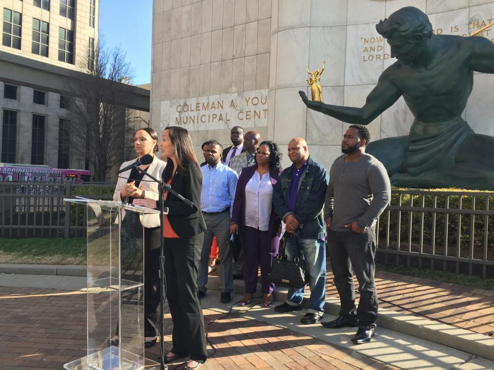 State Rep. Stephanie Chang, D-Detroit, and Detroit City Councilwoman Mary Sheffield announce proposed changes to the state's homeschooling system on April 17, 2015 outside of the Coleman A. Young Municipal Center. The proposed changes come after two children, Stoni Blair and Stephen Berry, were found dead in a Detroit apartment. The children had reportedly been taken out of school to be homeschooled. Their family members attended the news conference.