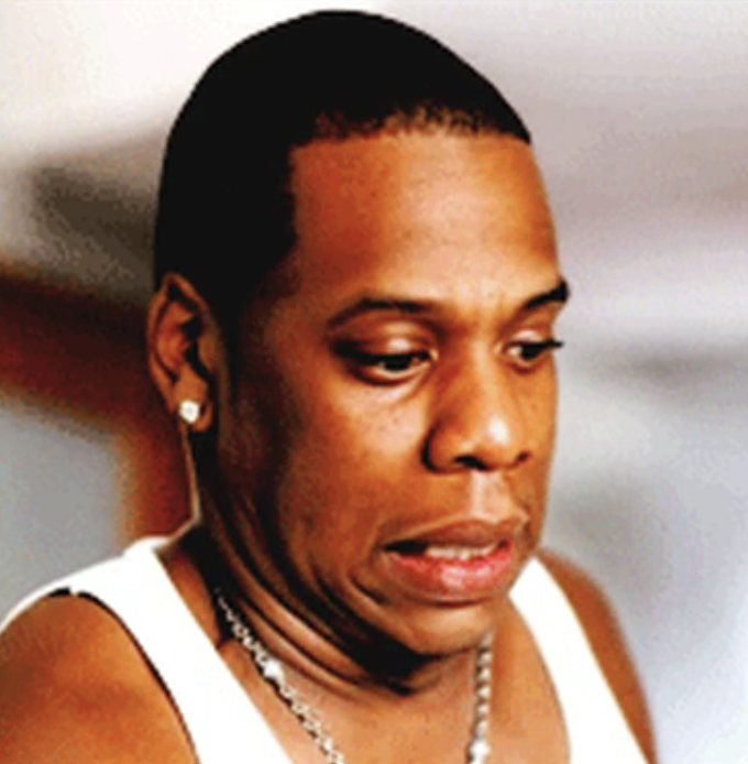 Jay-Z in his "I Just Wanna Love U (Give It 2 Me)" music video grimacing