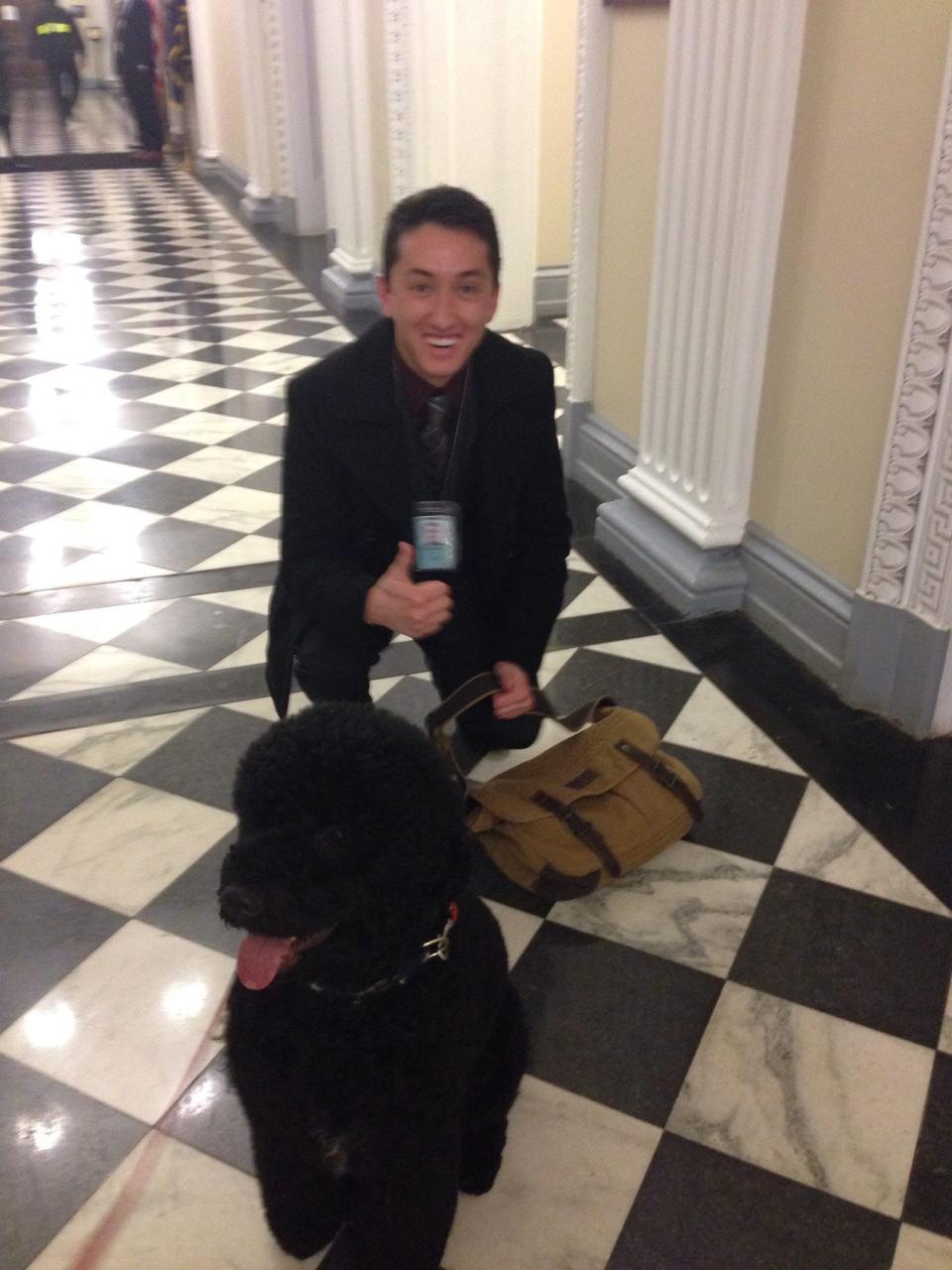 Julian Sarafian with one of the first dogs Sunny on the ground floor of the Eisenhower Executive Office Building.