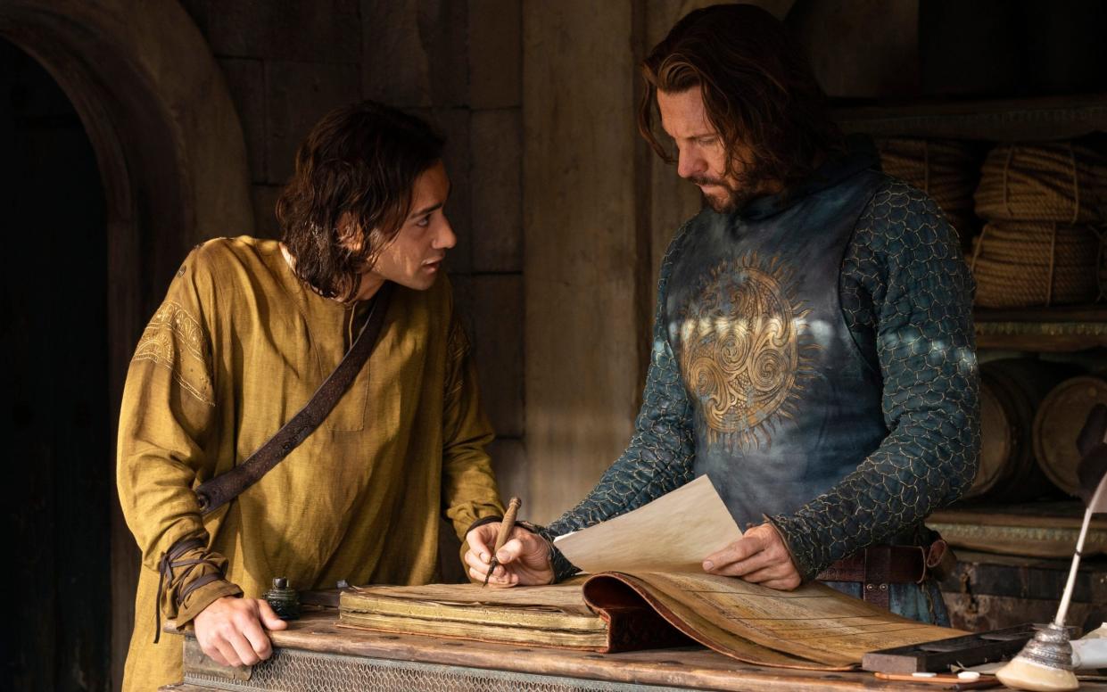 Maxim Baldry as Isildur and Lloyd Owen as Elendil in The Rings of Power - Amazon Prime Video
