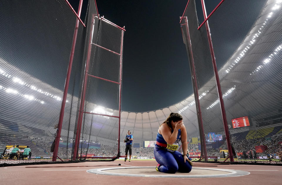 Deanna Price, of the United States, celebrates winning the gold medal for the women's hammer throw at the World Athletics Championships in Doha, Qatar, Saturday, Sept. 28, 2019. (AP Photo/David J. Phillip)