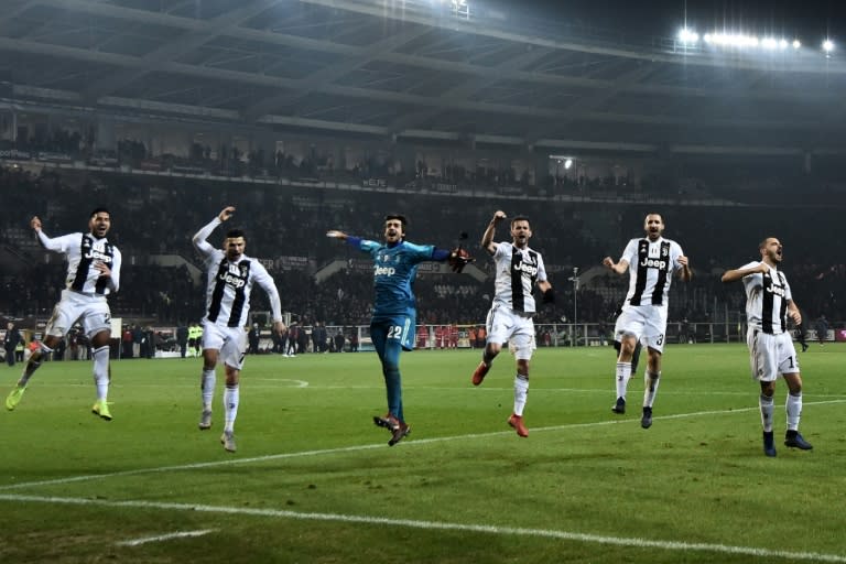 In the groove: Cristiano Ronaldo (Second from L) celebrates with his Juventus teammates after beating Torino