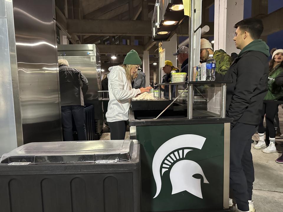 A concession stand that offers alcohol is shown at Spartan Stadium before the Michigan-Michigan State NCAA college football game Saturday, Oct. 21, 2023, in East Lansing, Mich. Michigan State University started selling alcoholic beverages at the stadium this fall. According to a survey by The Associated Press of Power Five conference schools and Notre Dame, 55 of 69 of them sell alcohol in the public areas of their stadiums on game days. (AP Photo/Mike Householder)
