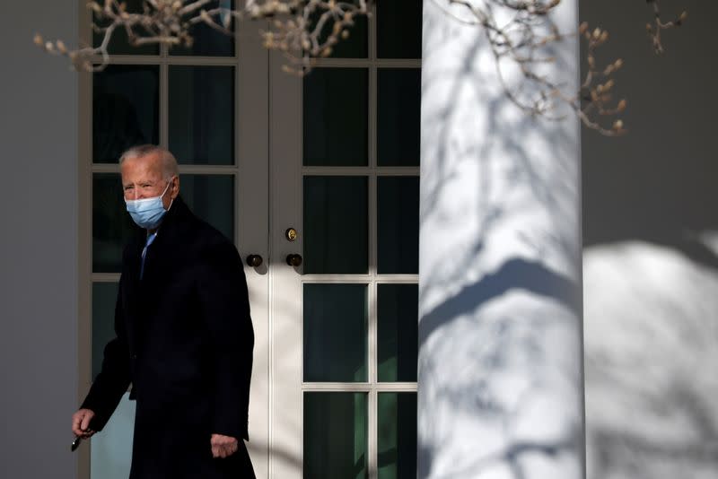 FILE PHOTO: U.S. President Biden walks into Oval Office in Washington