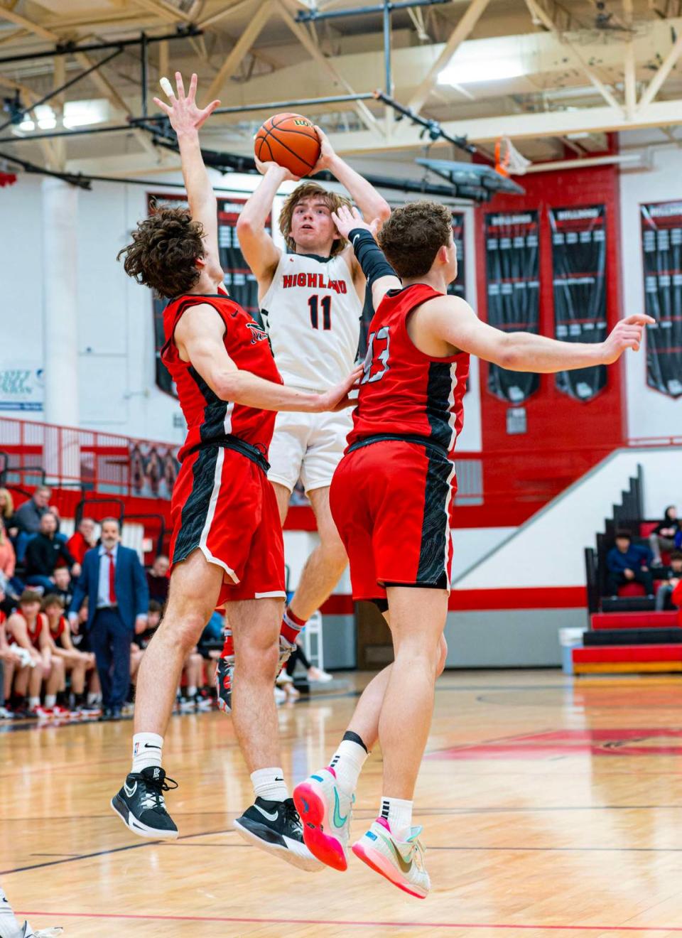 Highland’s Jake Ottensmeier shoots the ball during Friday night’s Mississippi Valley Conference game against Triad. The Knights ultimately posted a 50-37 victory.