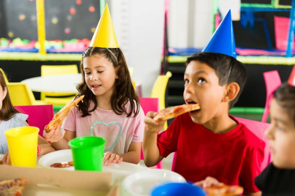 The birthday party was held at the birthday boy’s favorite pizza place. Getty Images