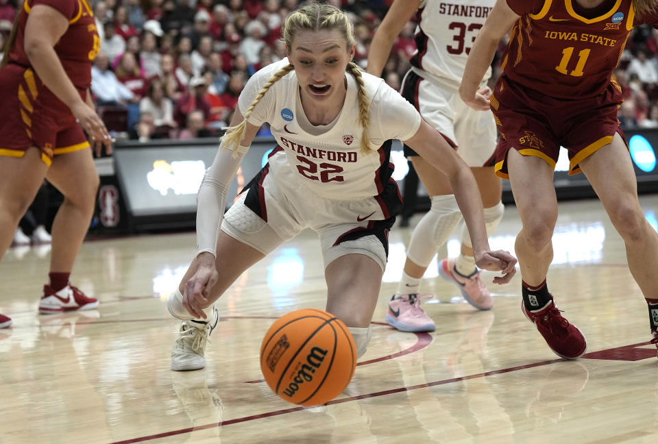 PALO ALTO, CALIFORNIA - MARCH 24: Cameron Brink #22 of the Stanford Cardinal dives for a lose ball against the Iowa State Cyclones during the first half in the second round of the NCAA Women's Basketball Tournament at Stanford Maples Pavilion on March 24, 2024 in Palo Alto, California. (Photo by Thearon W. Henderson/Getty Images)