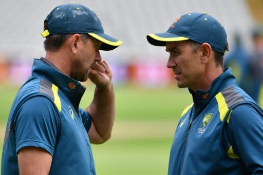 Tough call - Australia coach Justin Langer (R), pictured talking to assistant Ricky Ponting, has opted to play Josh Hazlewood against England at Lord's