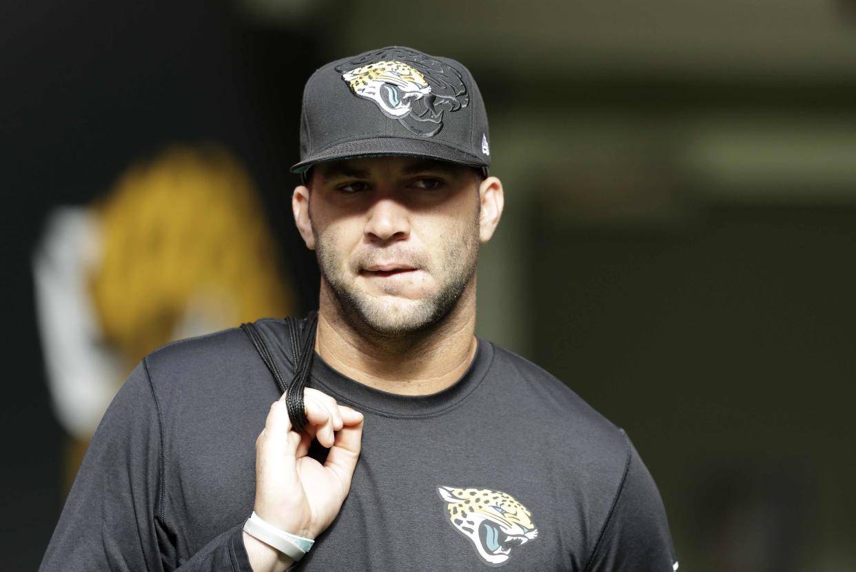 Jacksonville Jaguars quarterback Blake Bortles (5) arrives for a warm-up session before an NFL football game against Indianapolis Colts at Wembley stadium in London, Sunday Oct. 2, 2016. (AP Photo/Matt Dunham)
