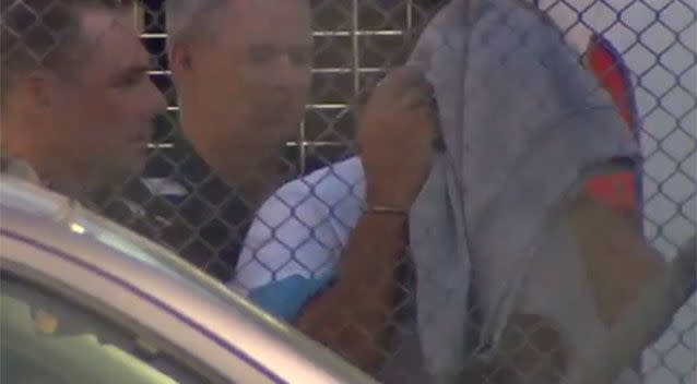 Michael Cardamone is brought into Wangaratta Magistrates Court on Tuesday. Photo: 7 News