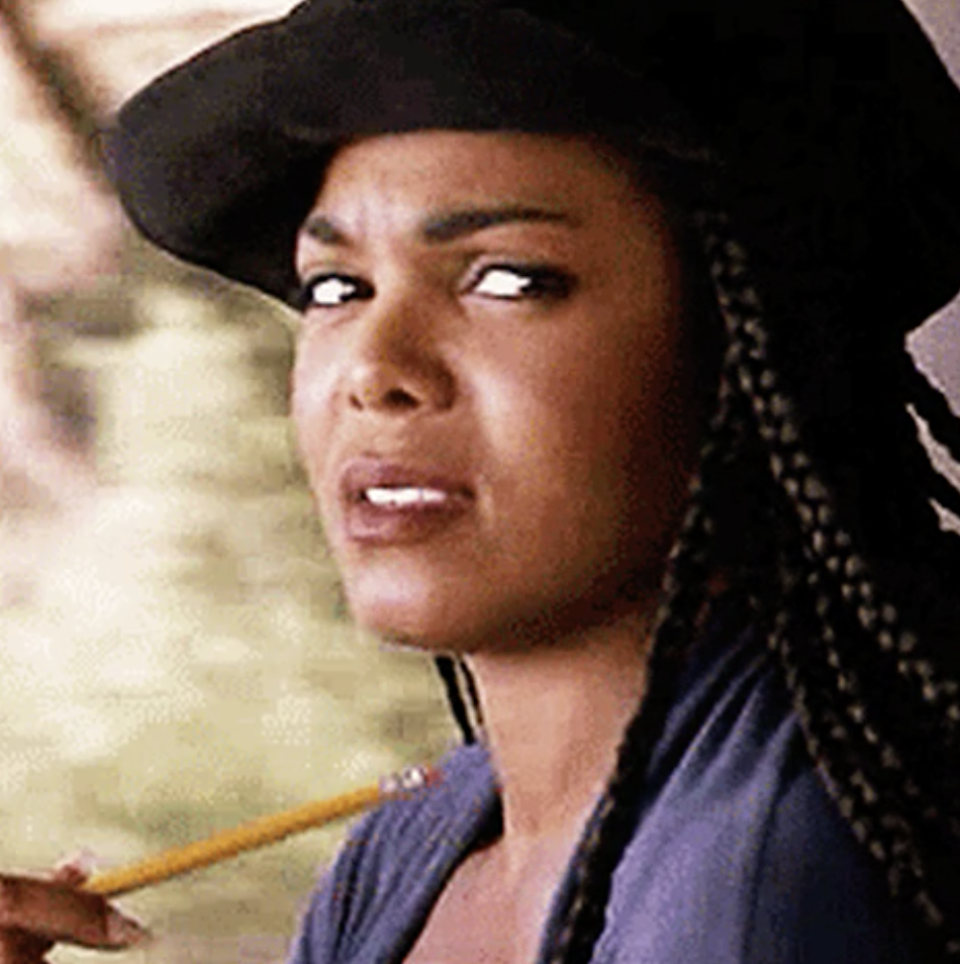 Janet Jackson looking at someone with judgement in a scene from "Poetic Justice"