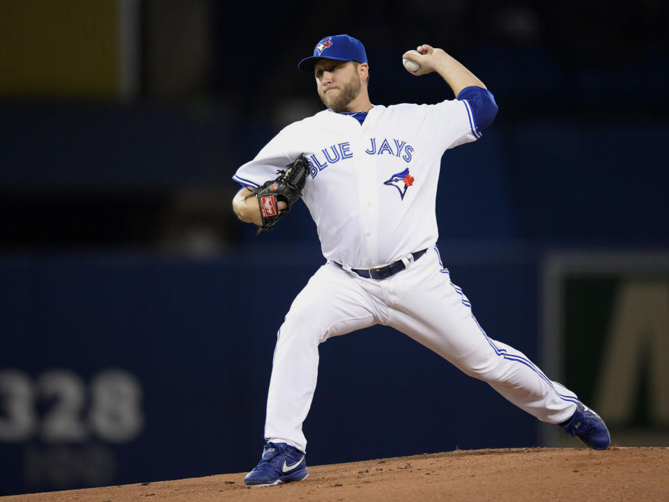 Toronto Blue Jays starting pitcher Mark Buehrle pitches against the Los Angeles Angels during first inning American League baseball action in Toronto on Monday, May 12, 2014. (AP Photo/The Canadian Press, Frank Gunn)