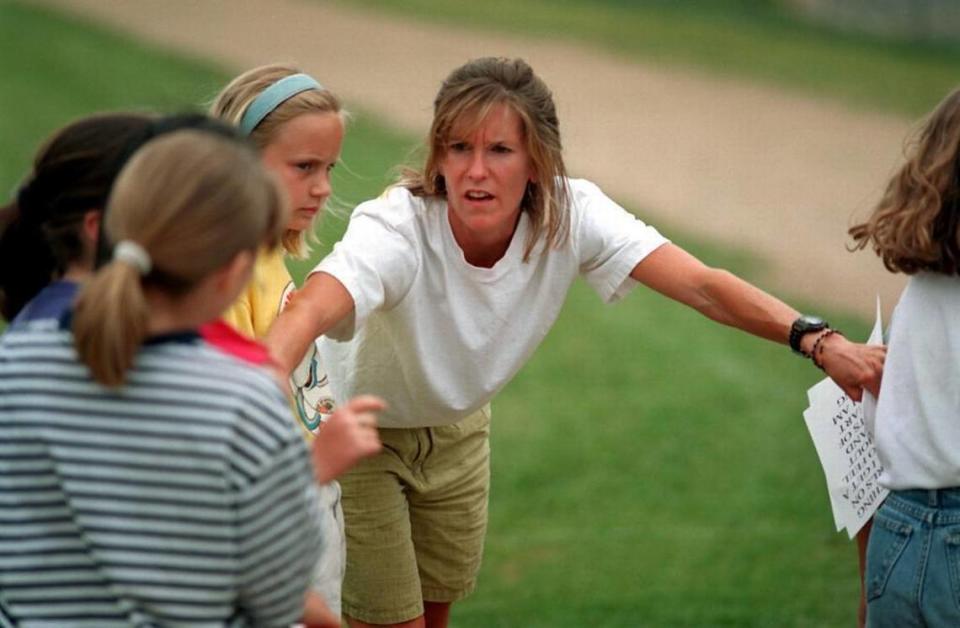 Molly Barker coaches a Girls on the Run group at Charlotte Country Day in 1997, a year after founding the organization.