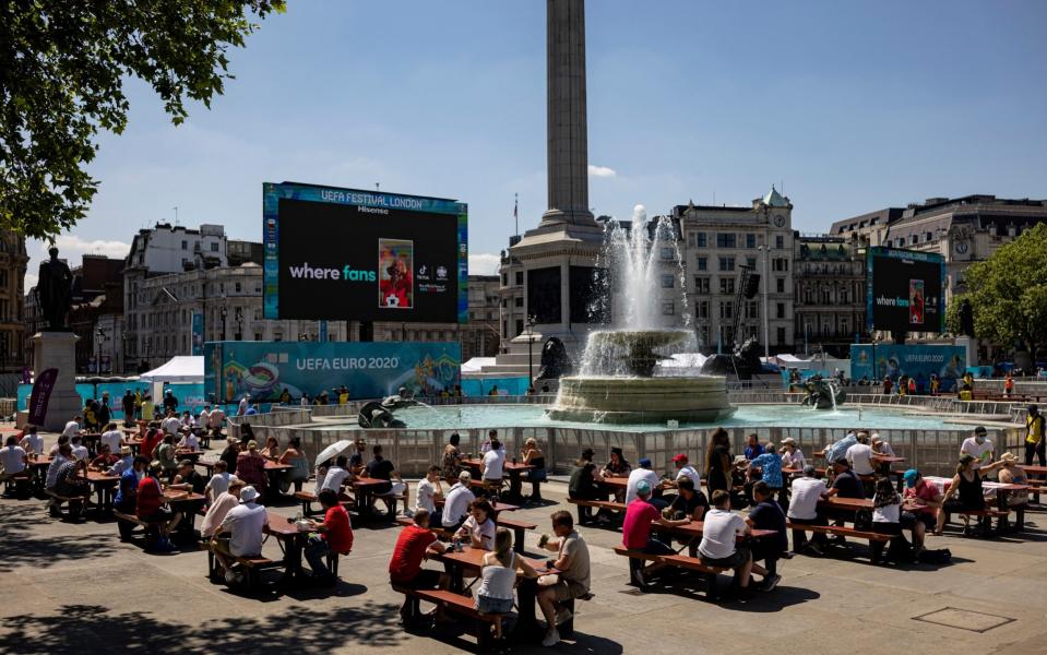 Key workers await the start of England's opening game against Croatia in a fanzone in Trafalgar Square on June 13, 2021 - Rob Pinney/Getty Images