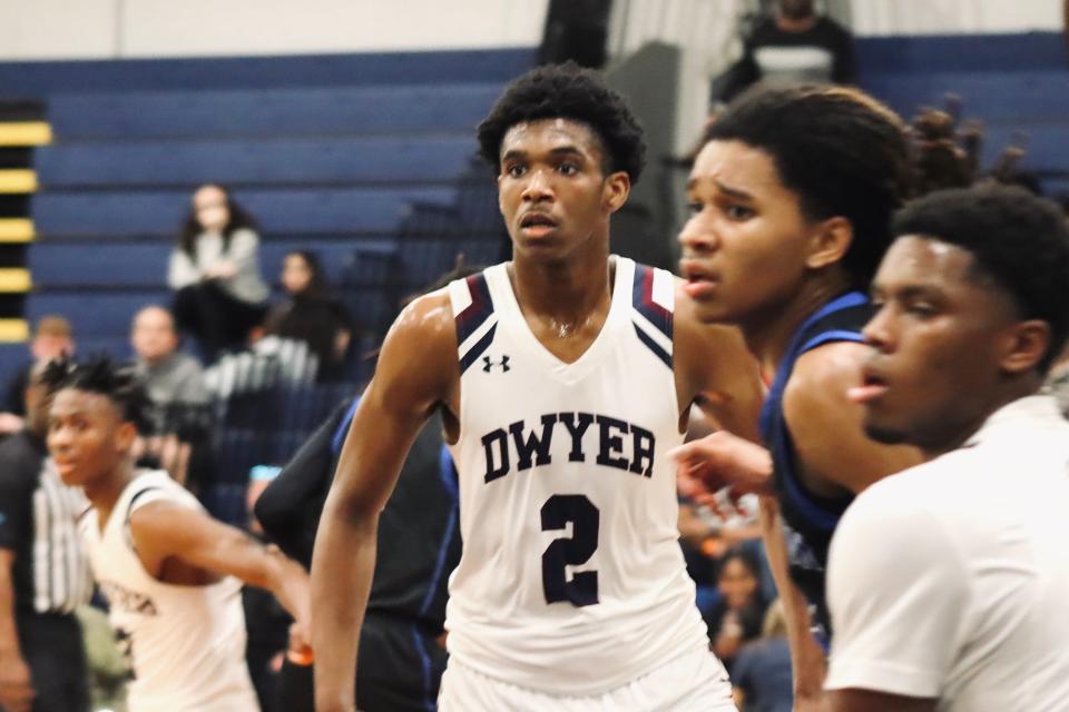 Dwyer senior Amari Nealy watches the action in the Panthers' 67-59 win over Wellington in Palm Beach Gardens on Jan. 9, 2024.