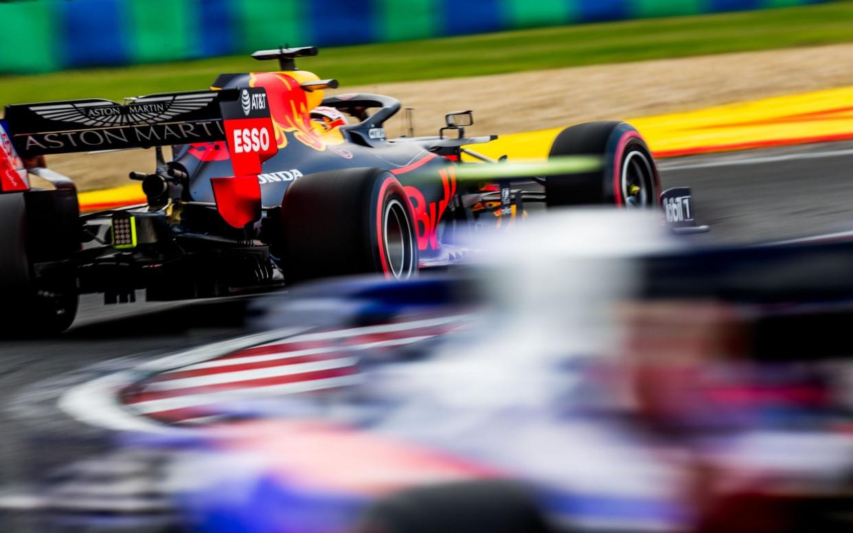 A Red Bull drives on track in the Hungarian GP 2019 - PETER J FOX/AFP