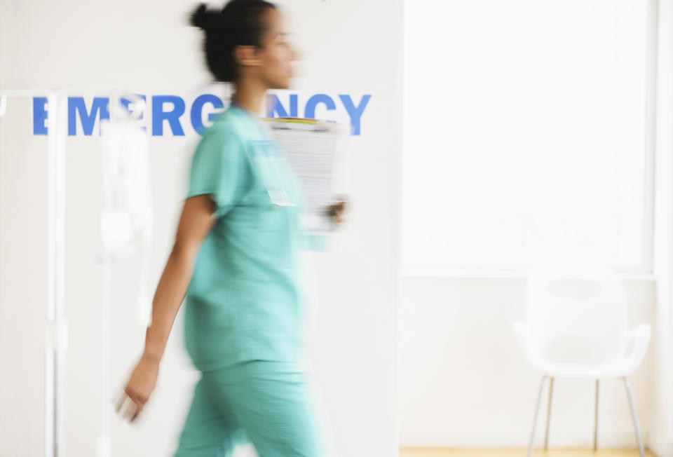 nurse walking into the emergency room