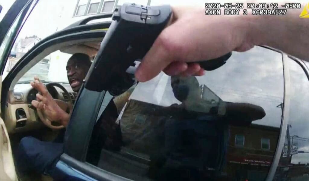 George Floyd responds to police after they approached his car outside Cup Foods in Minneapolis in this May 25, 2020, file pool photo from police body camera video. (Court TV via AP, Pool, File)