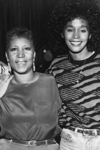 <p>Michael Ochs Archives/Getty</p> Aretha Franklin and Whitney Houston