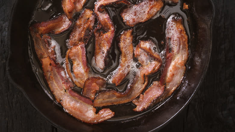 Bacon cooking in fat