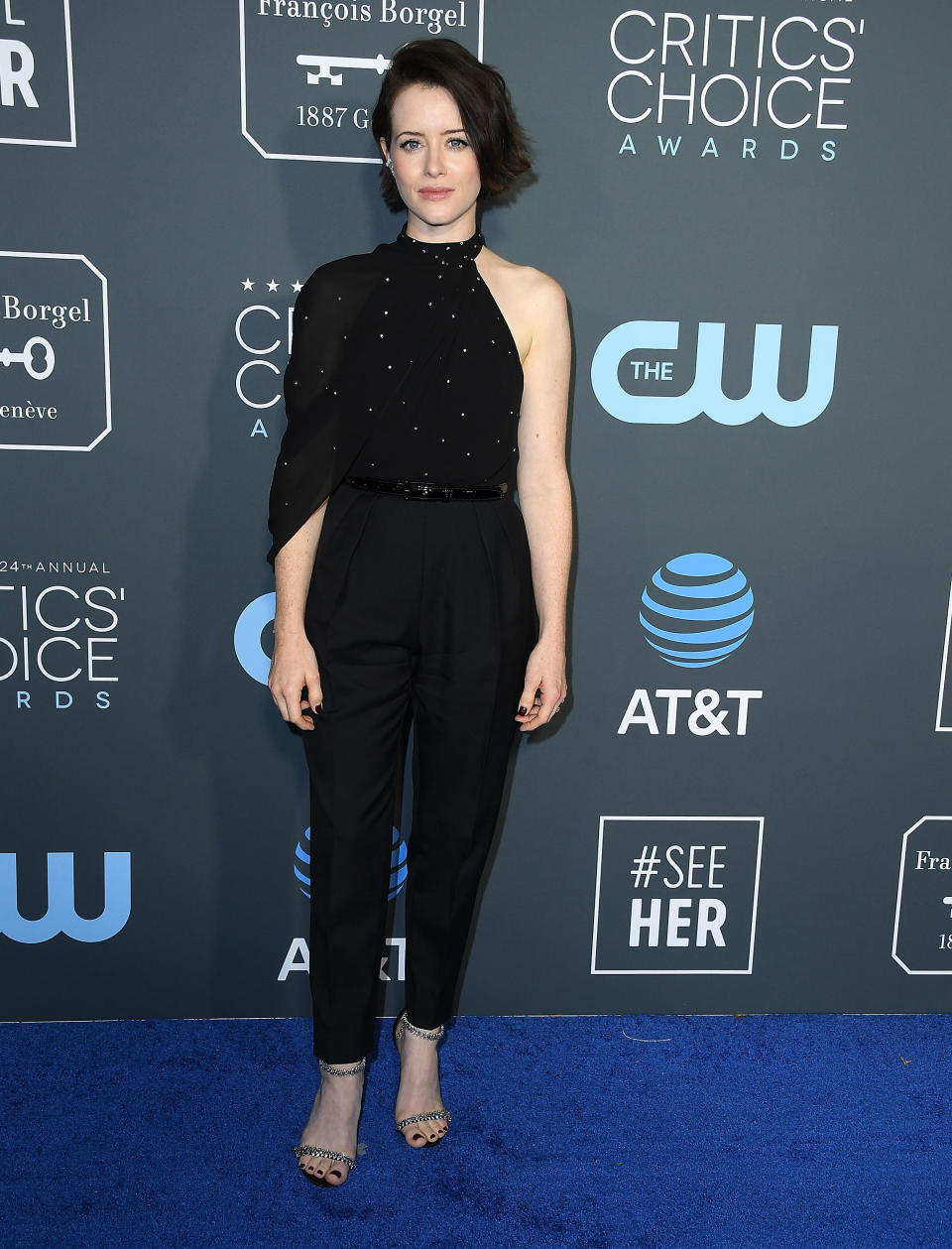 <p>The ‘First Man’ actress wore a Celine jumpsuit paired with Jimmy Choo sandals at the awards ceremony.<em> [Photo: Getty]</em> </p>