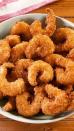 <p>Popcorn prawns should be two things: Easy to make and easy to eat. With a homemade spicy tartare sauce, they are completely addictive and you'll want to just keep poppin' them in your mouth!</p><p>Get the <a href="https://www.delish.com/uk/cooking/recipes/a30166674/popcorn-shrimp-recipe/" rel="nofollow noopener" target="_blank" data-ylk="slk:Popcorn Prawns;elm:context_link;itc:0;sec:content-canvas" class="link ">Popcorn Prawns</a> recipe.</p>