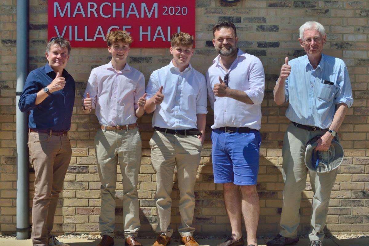 Abingdon School business students Max and Oliver with members of Marcham Community Centre <i>(Image: Abingdon School)</i>