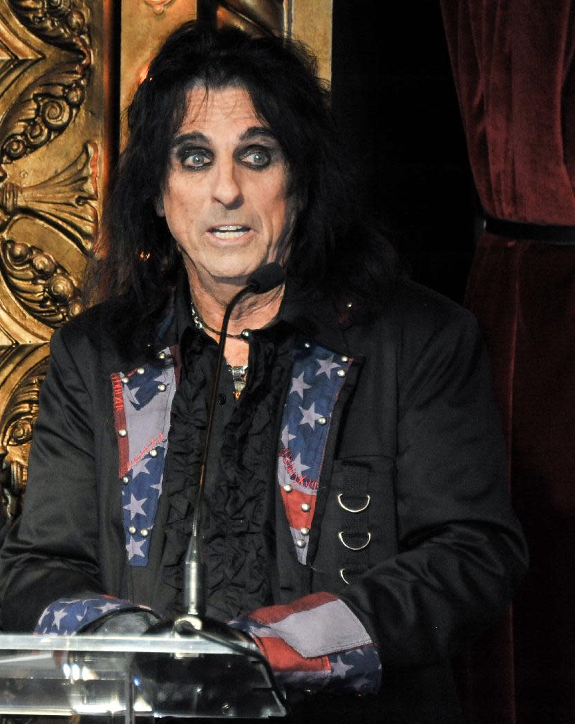 Alice Cooper attends the Motley Crue Press Conference, Tuesday, Jan. 28, 2014, in Los Angeles. The heavy-metal band says it will retire after performing 72 goodbye concerts. The band made the announcement at the press conference. (Photo by Richard Shotwell/Invision/AP)