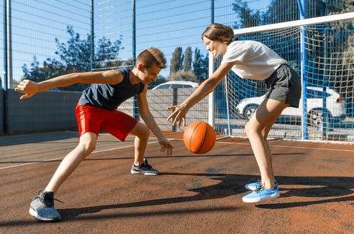 <span class="caption">Learning health habits in your teens can help protect you from developing heart disease in adulthood. </span> <span class="attribution"><a class="link " href="https://www.shutterstock.com/image-photo/streetball-basketball-game-two-players-teenagers-1310688317?src=ShcKUbEjWFklM7Ys9LiDvg-1-67" rel="nofollow noopener" target="_blank" data-ylk="slk:VH-studio/ Shutterstock;elm:context_link;itc:0;sec:content-canvas">VH-studio/ Shutterstock</a></span>