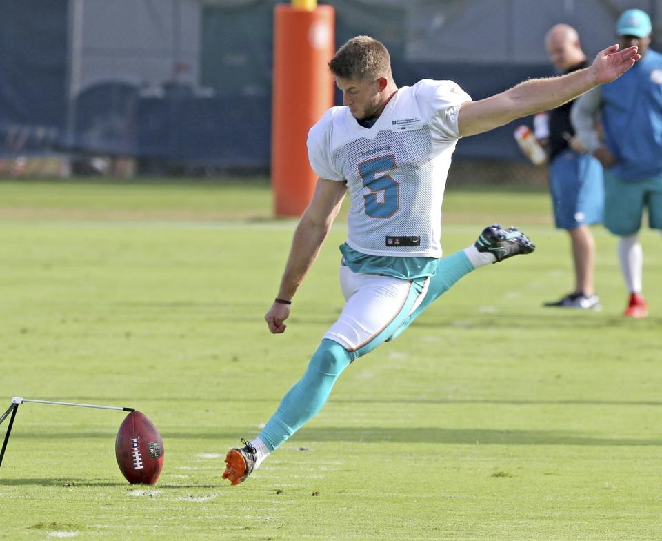 FILE - In this Aug. 13, 2018, file photo, kicker Greg Joseph works during a drill at the Miami Dolphins NFL football training camp in Davie, Fla. A person familiar with the decision says the Cleveland Browns will sign free agent kicker Greg Joseph to replace Zane Gonzalez, who missed four attempts in Sunday’s loss at New Orleans. Joseph was picked over several other kickers who in came in for tryouts on Monday, Sept. 17, 2018, said the person who spoke to The Associated Press on condition of anonymity because the team has not announced the signing. (Charles Trainor Jr./Miami Herald via AP, File)