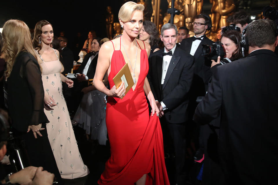 Emily Blunt and Charlize Theron seen backstage at the Oscars on Sunday, Feb. 28, 2016, at the Dolby Theatre in Los Angeles. 