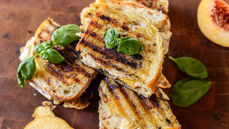 3 halves of panini on cutting board