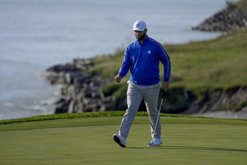 Team Europe's Jon Rahm reacts after making a putt to win the eighth hole during a foursome match the Ryder Cup at the Whistling Straits Golf Course Friday, Sept. 24, 2021, in Sheboygan, Wis. (AP Photo/Ashley Landis)