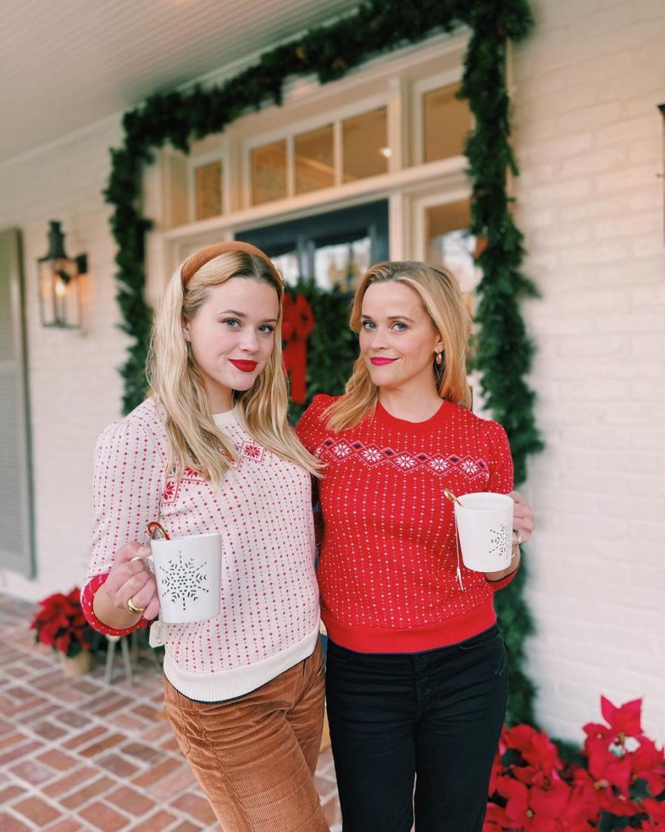 Reese Witherspoon was 'twinning' with lookalike daughter Ava Phillippe, 21, in festive jumpers. Photo: Instagram/reesewitherspoon.