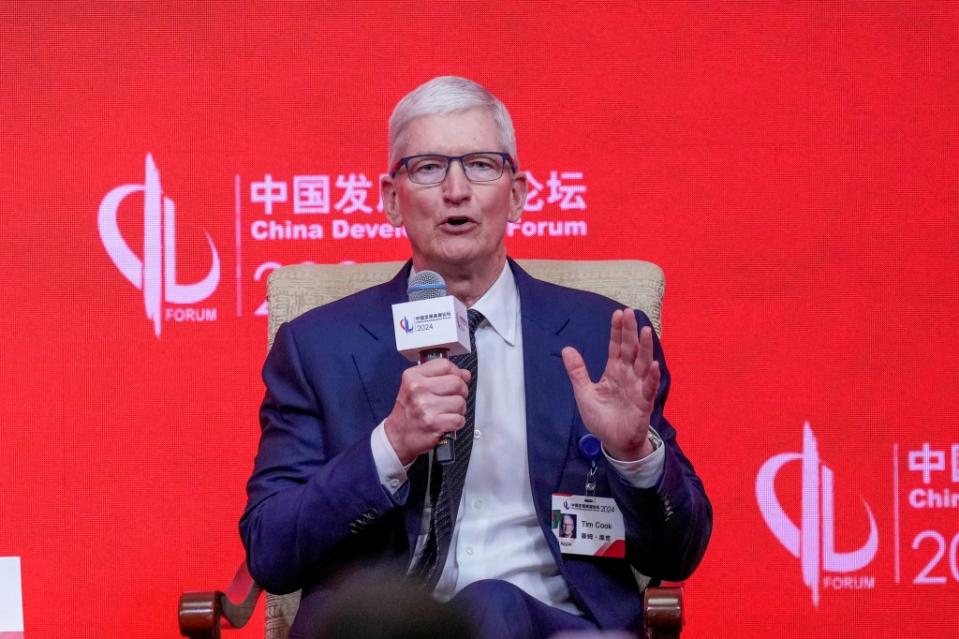 Apple CEO Tim Cook is under pressure to produce a revenue-generating product that can approach the success of the iPhone. AP