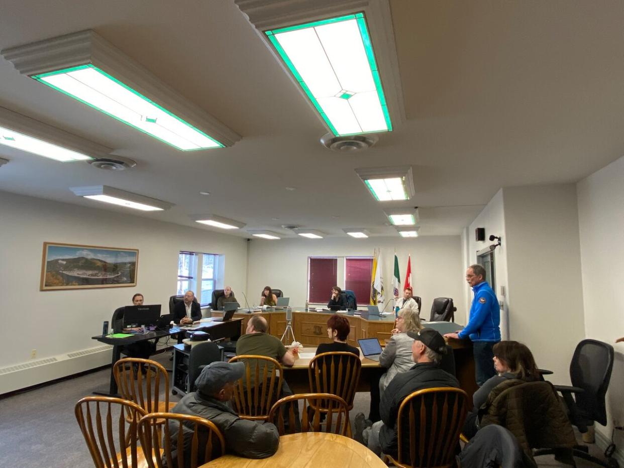The town council in Dawson City, Yukon, at a meeting in December. On Tuesday, councillors rejected a proposal by the mayor to reconsider the location of the town's planned new recreation centre. (Chris MacIntyre/CBC - image credit)