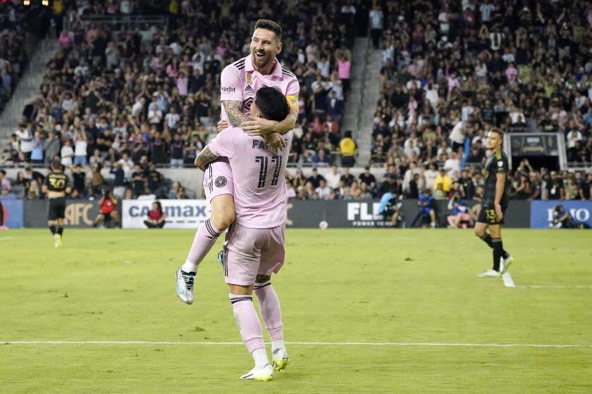 Inter Miami midfielder Facundo Farias, below, celebrates his goal with forward Lionel Messi during the first half of a Major League Soccer match against the Los Angeles FC Sunday, Sept. 3, 2023, in Los Angeles. (AP Photo/Mark J. Terrill)