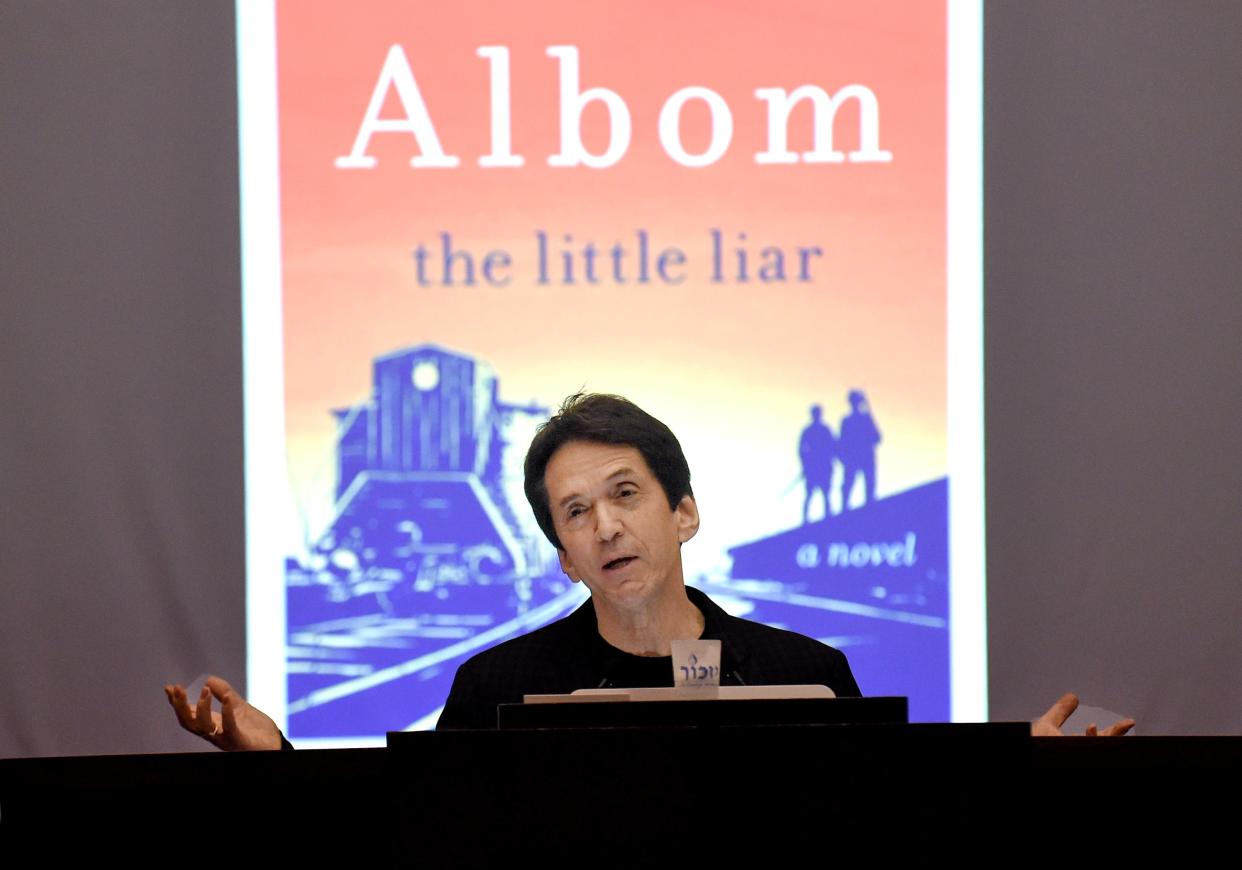 Mitch Albom, a best-selling author, talks about his new book, 'The Little Liar,' as part of the Rappaport Center Speaker Series at Temple Beit HaYam on Wednesday, Jan. 24, 2024, in Stuart. The book, a work of historical fiction, is centered around two brothers and a classmate who survive Nazi death camps during World War II.