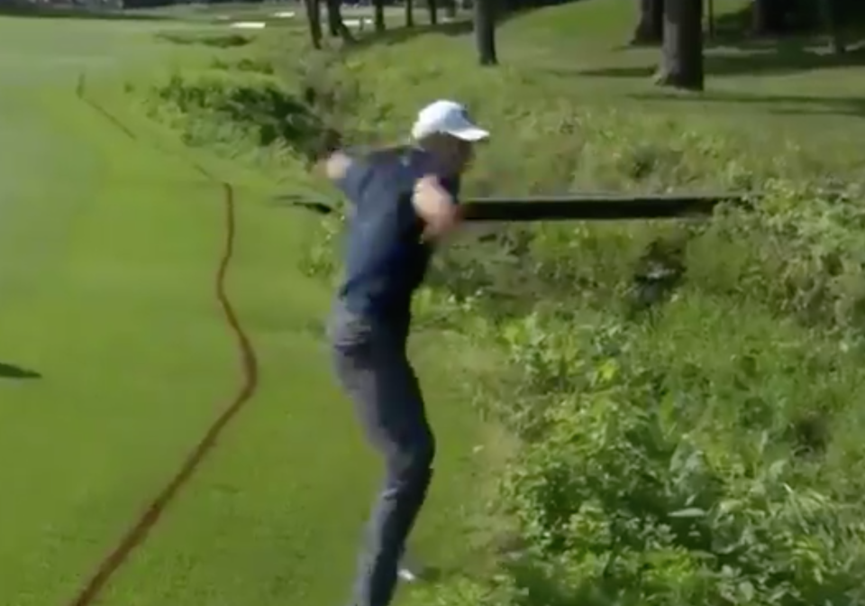 Jordan Spieth finds ball in hazard, angrily hurls it back in disgust. (Screengrab)