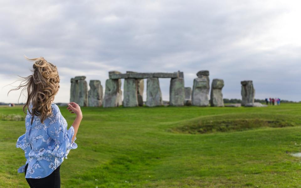 Girl looking at Stonehenge - FluxFactory