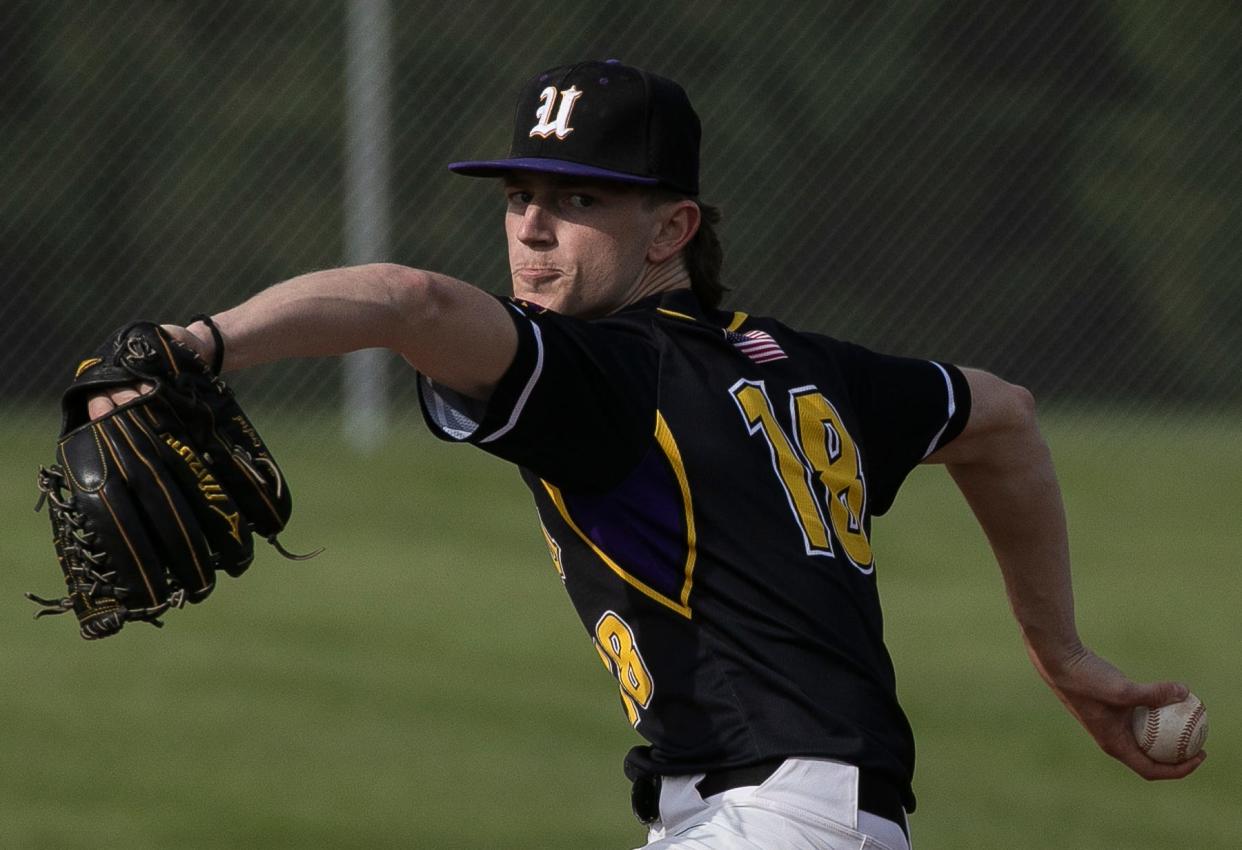 Unioto pitcher Ashton Crace (18) fires in a pitch against a Zane Trace batter in boys baseball at Unioto High School on April 26, 2024, in Chillicothe, Ohio. Unioto defeated Zane Trace 4-1.