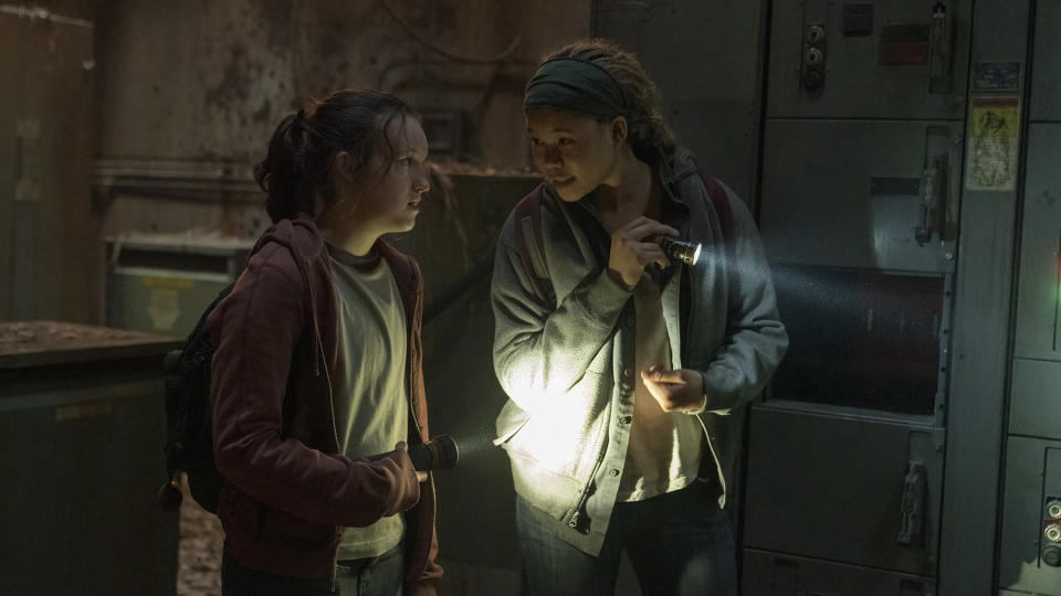 Ellie and Riley explore an abandoned arcade in The Last of Us season 1