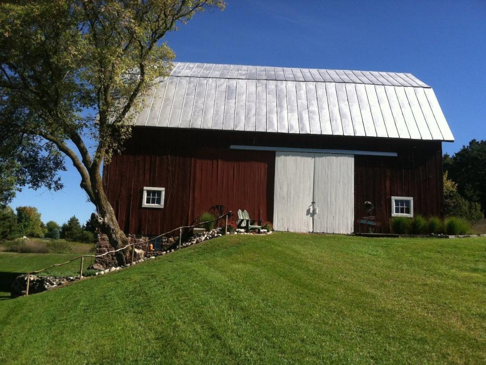 an Airbnb listing called Country living close to Downtown. No cleaning fee in Traverse City, Michigan