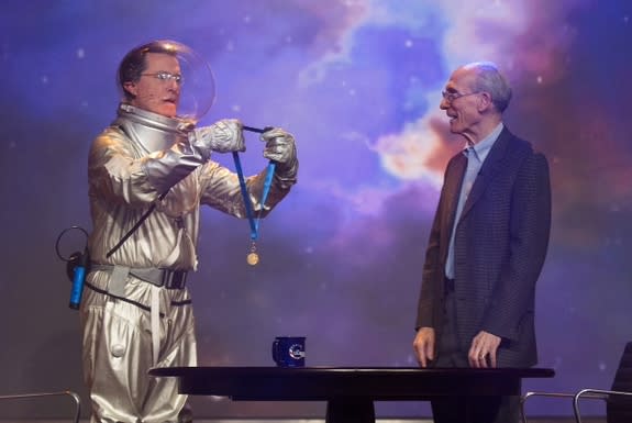 Galactic commander and talk show host Stephen 'Tiberius' Colbert presented Ed Stone with a NASA Distinguished Public Service Medal for his work on the Voyager spacecraft over the past four decades. Stone was a guest on Colbert's show on Dec. 3,