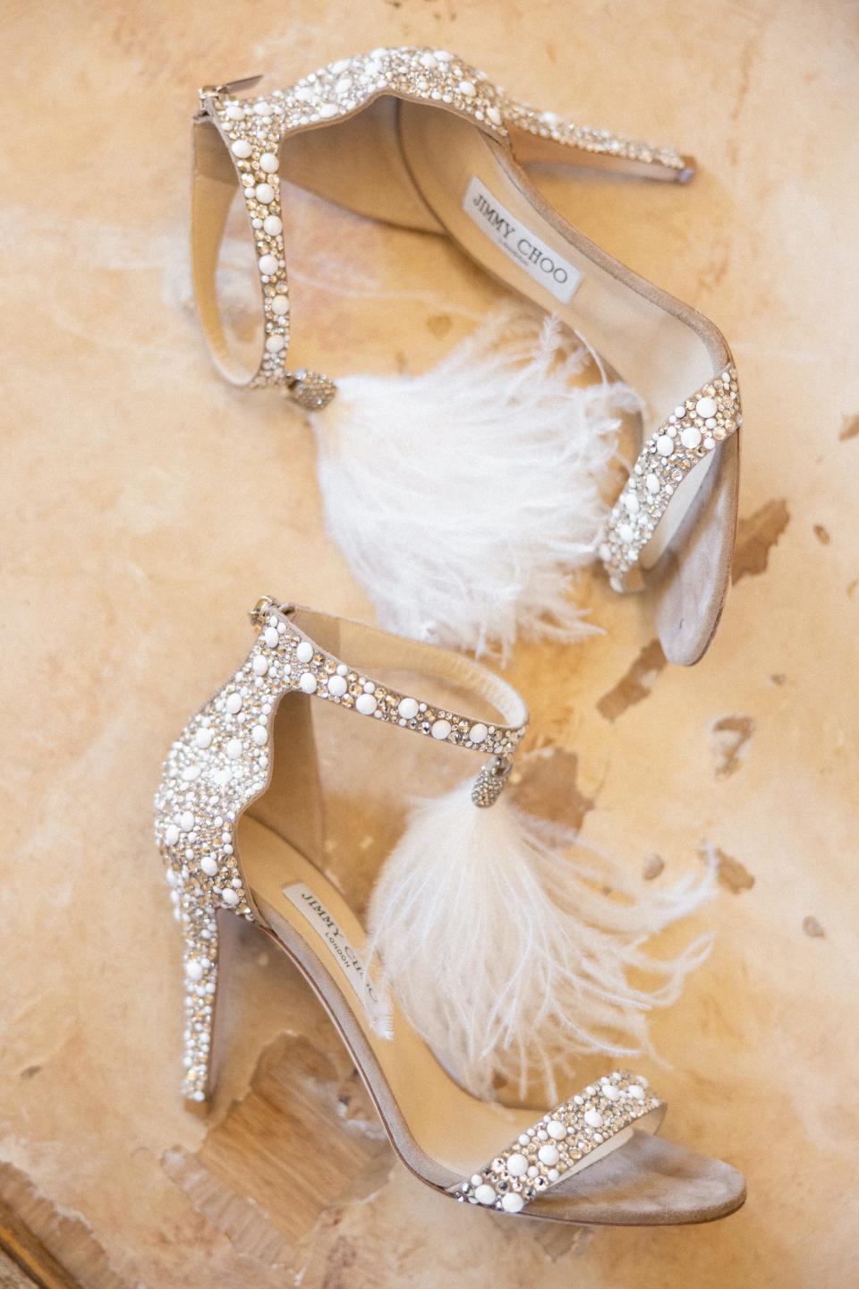 A pair of sparkly, feathered high heels