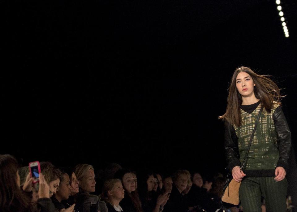 A model walks the runway during the Rebecca Minkoff Fall 2013 fashion show during Fashion Week, Friday, Feb. 8, 2013, in New York. (AP Photo/Karly Domb Sadof)