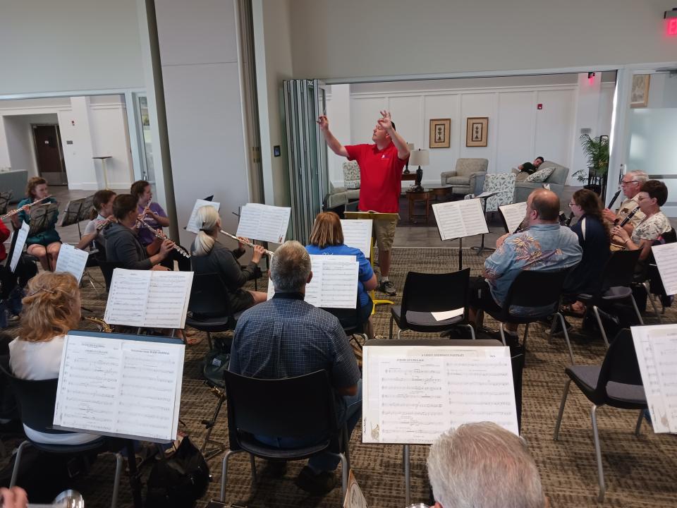 Randy Claes directs the band at a rehearsal in the Connection's Conference and Event Center on the campus of Westview Healthy Living.