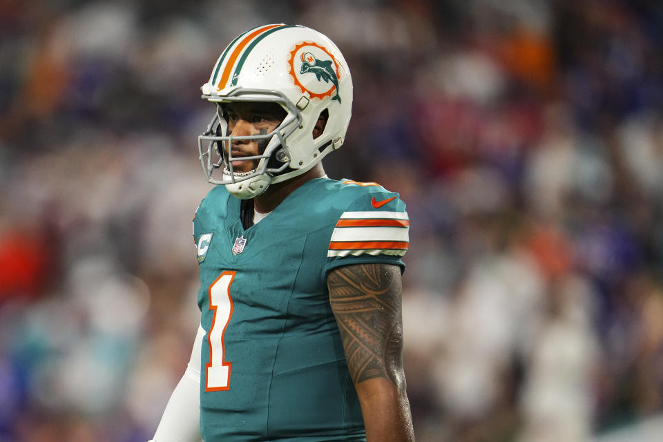 MIAMI GARDENS, FL - SEPTEMBER 12: Tua Tagovailoa #1 of the Miami Dolphins looks on from the field during an NFL football game against the Buffalo Bills at Hard Rock Stadium on September 12, 2024 in Miami Gardens, Florida. (Photo by Cooper Neill/Getty Images)